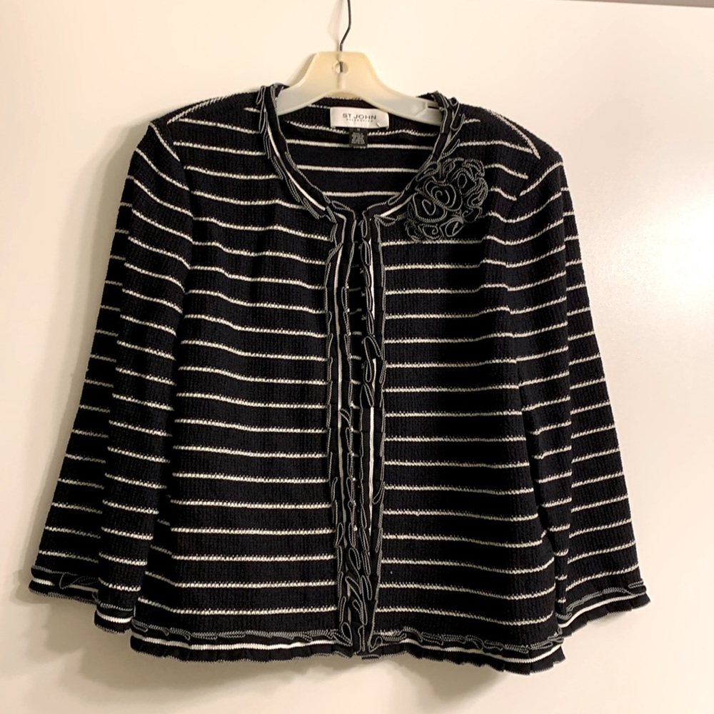 Black and white St John jacket with flower adornment.  Size 14